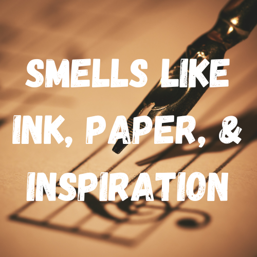An old fashioned ink well pen writes music notes on a sheet of aged paper. The words "smells like ink, paper, & inspiration" overlay the photo.